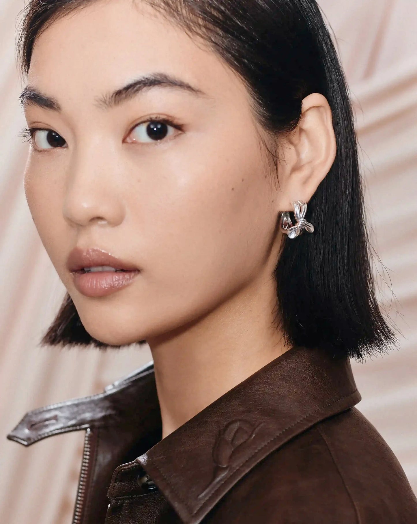 MARKGONG Bow Hoop Earrings | Silver Plated
