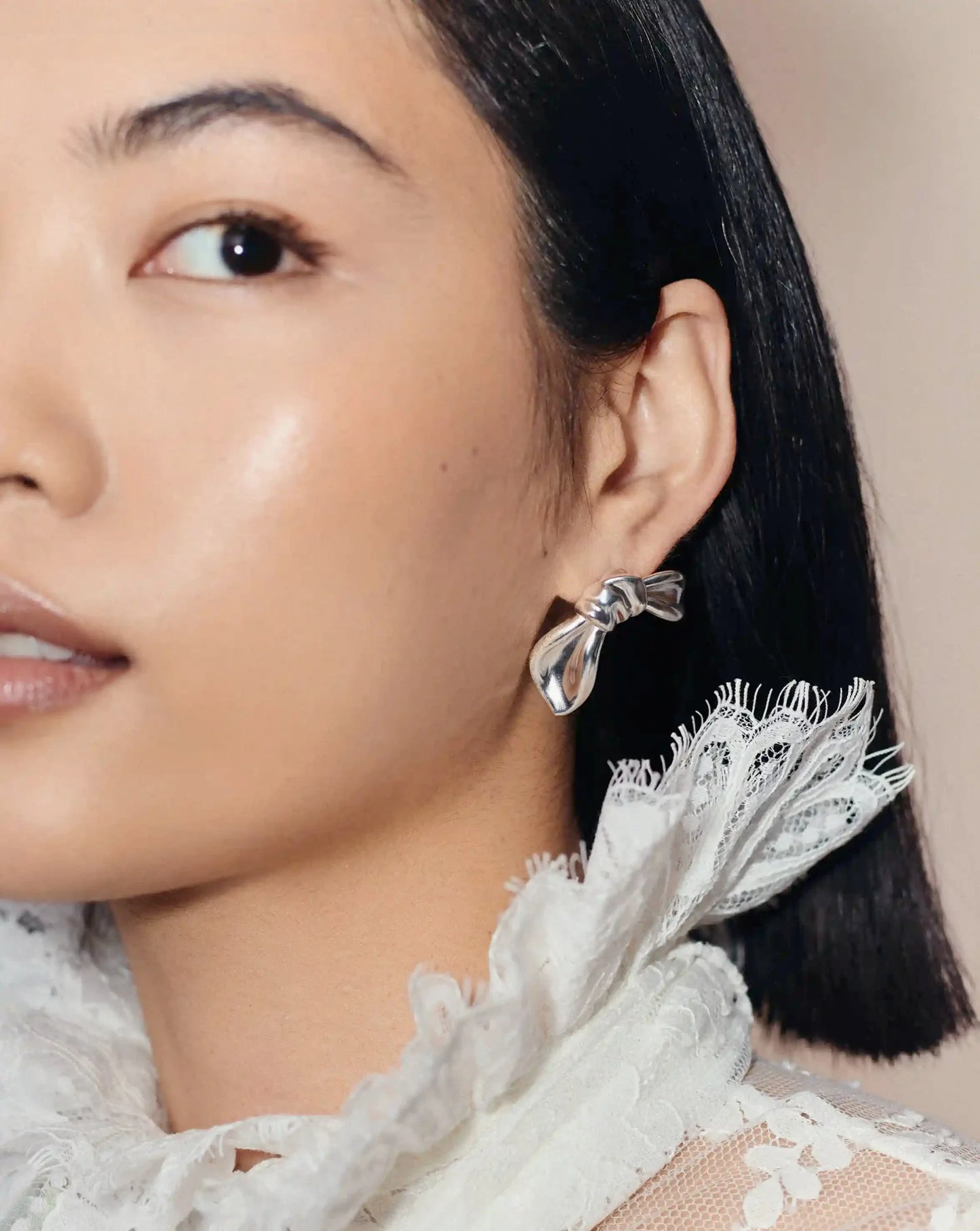 MARKGONG Bow Oversized Stud Earrings | Silver Plated