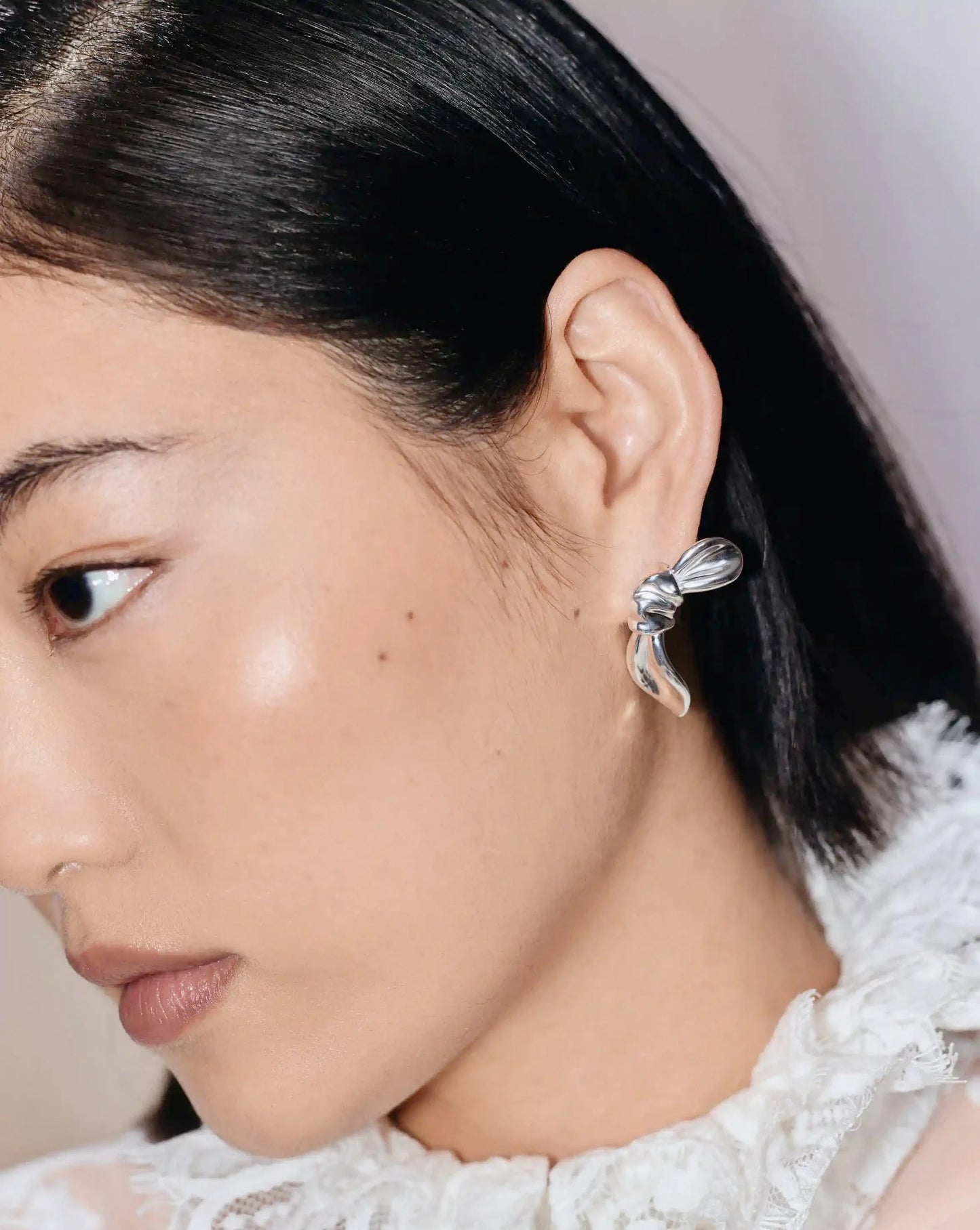 MARKGONG Bow Oversized Stud Earrings | Silver Plated